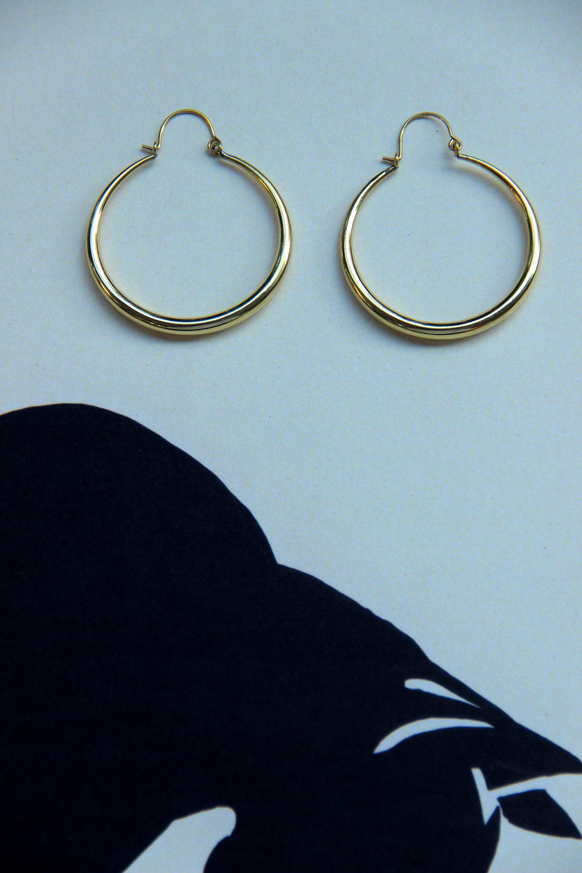 Gold toned brass hoop earrings