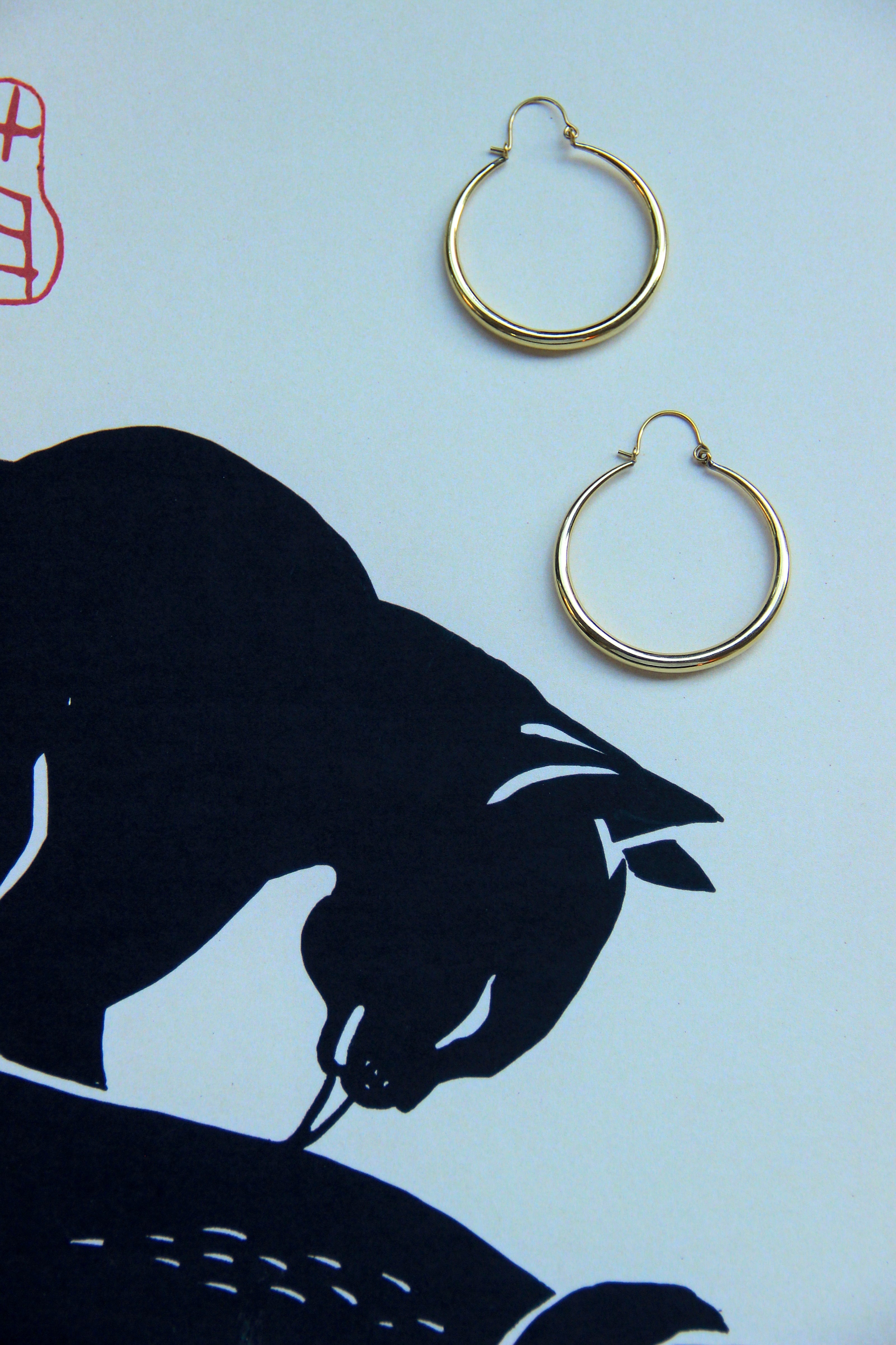 Gold toned brass hoop earrings