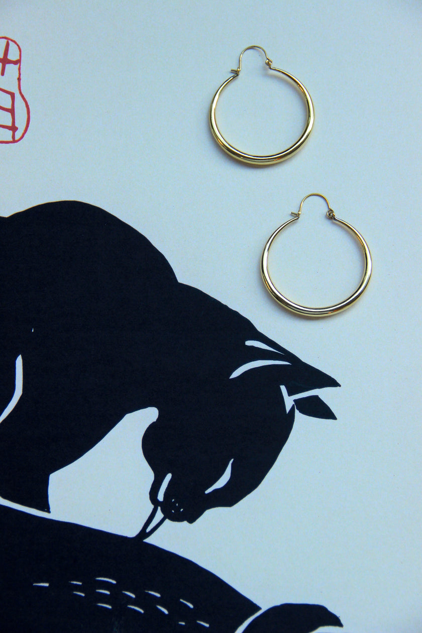 Gold toned brass hoop earrings