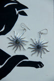 Silver toned brass sun earrings