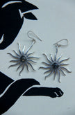 Silver toned brass sun earrings