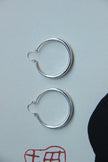 Silver toned brass hoop earrings
