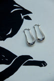 Silver toned brass earrings