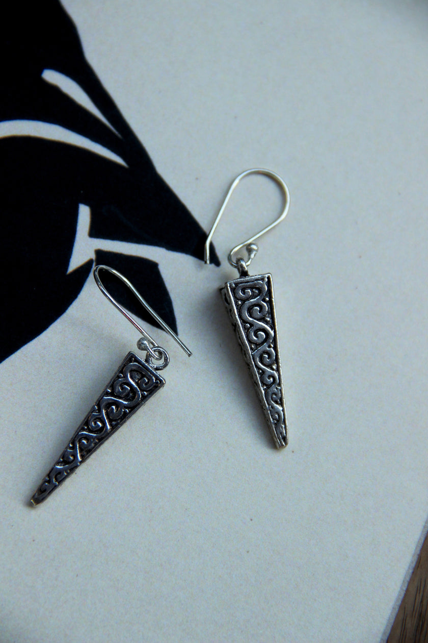 Silver toned brass earrings