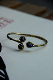 Stunning gold toned brass bracelet (blue stones)