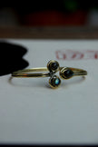 Stunning gold toned brass bracelet (grey stones)