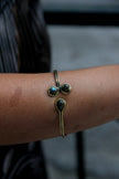 Stunning gold toned brass bracelet (grey stones)