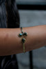 Stunning gold toned brass bracelet (grey stones)