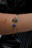 Stunning gold toned brass bracelet (blue stones)