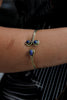 Stunning gold toned brass bracelet (blue stones)