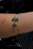 Stunning gold toned brass bracelet (blue stones)