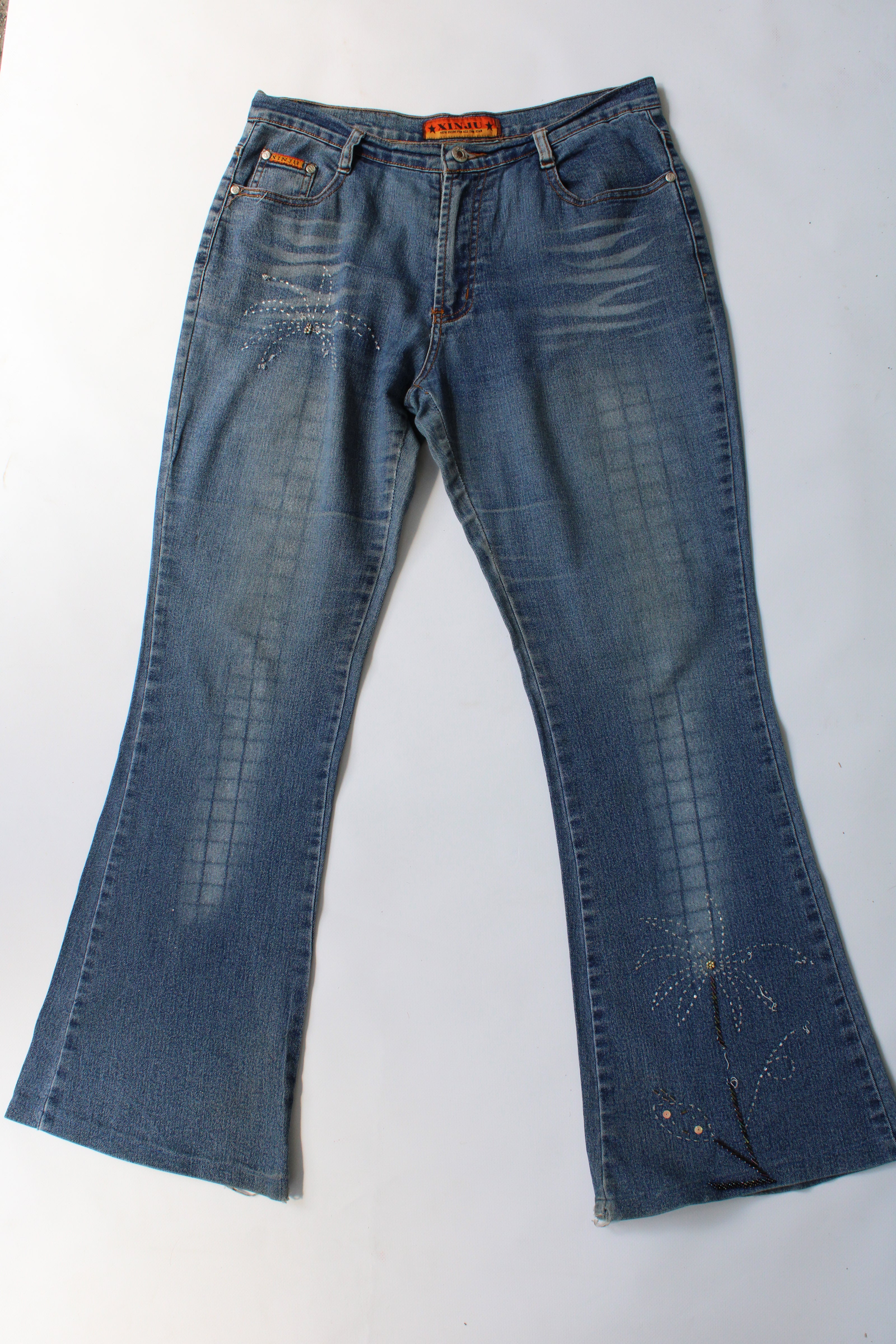 Super cute Y2K flare jeans with bead detailing