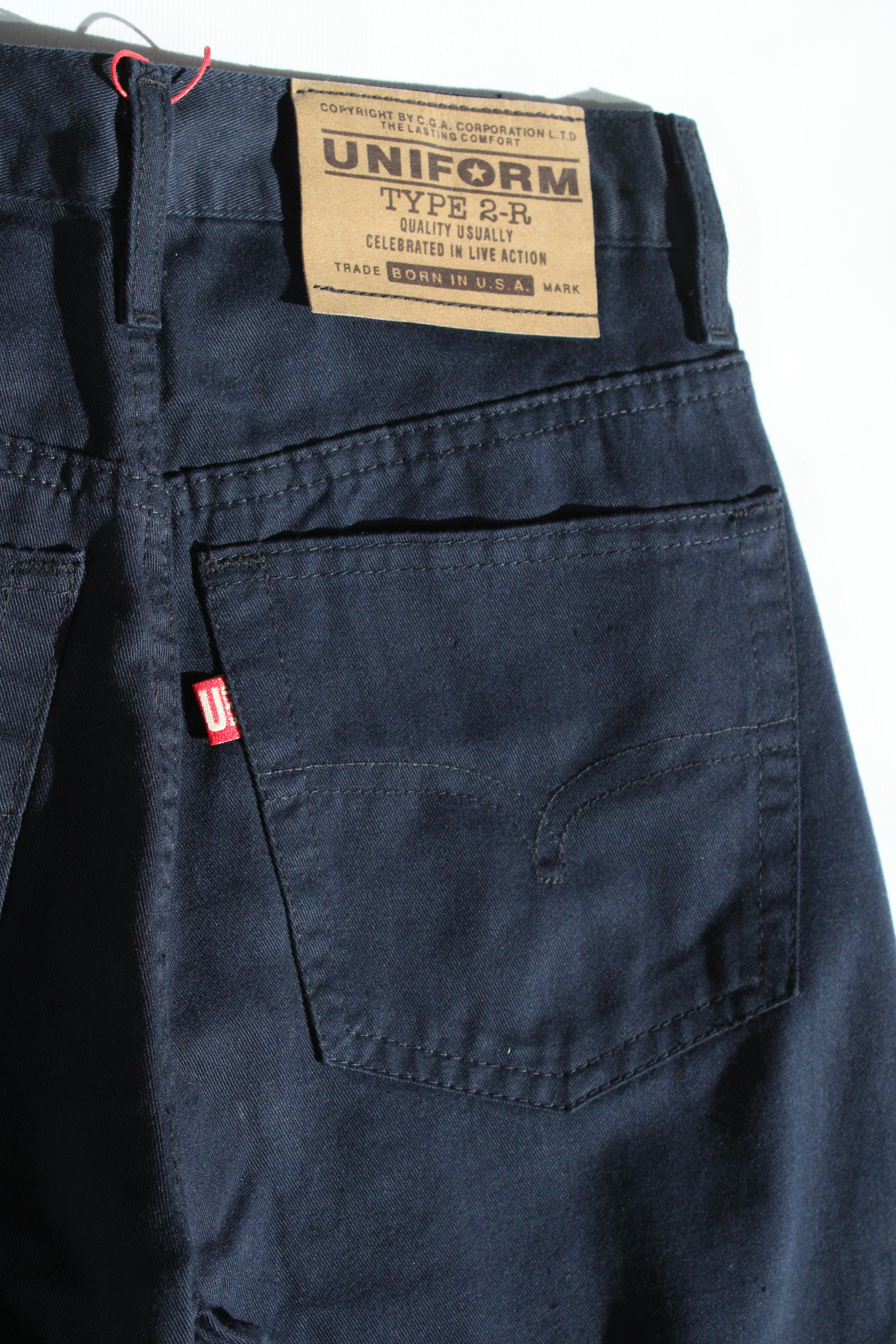 Uniform dead stock dark blue light jeans